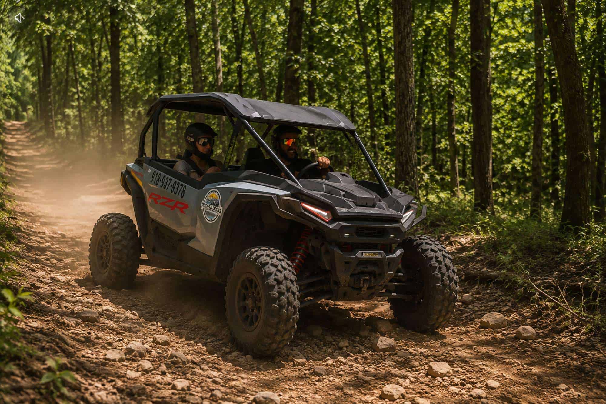Polaris RZR on a wooded trail during a guided UTV tour