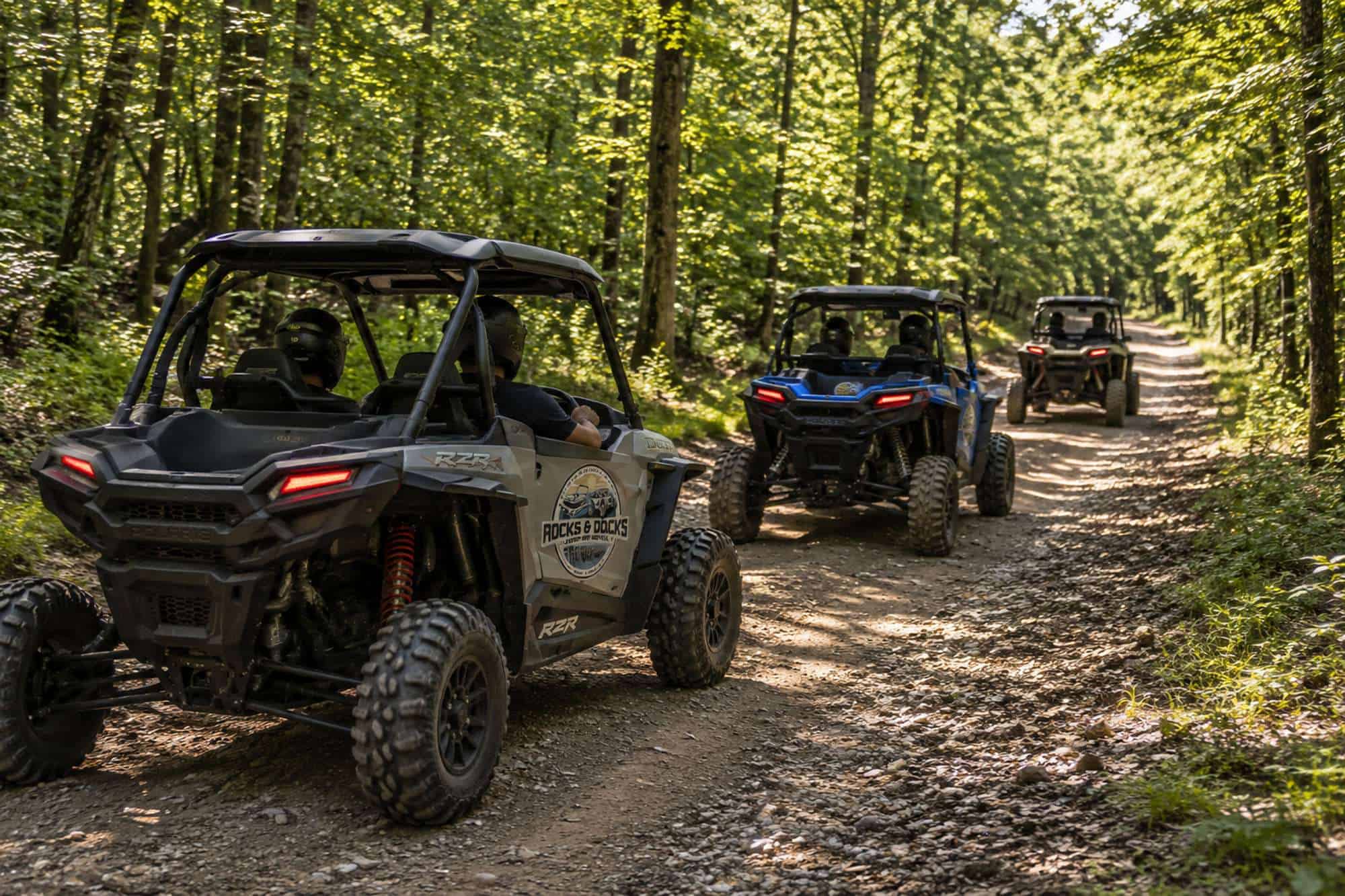 UTVs exploring an off-road trail through the woodsGuided-UTV-Tour3---Rocks-&-Docks,-Grand-Lake,-Oklahoma