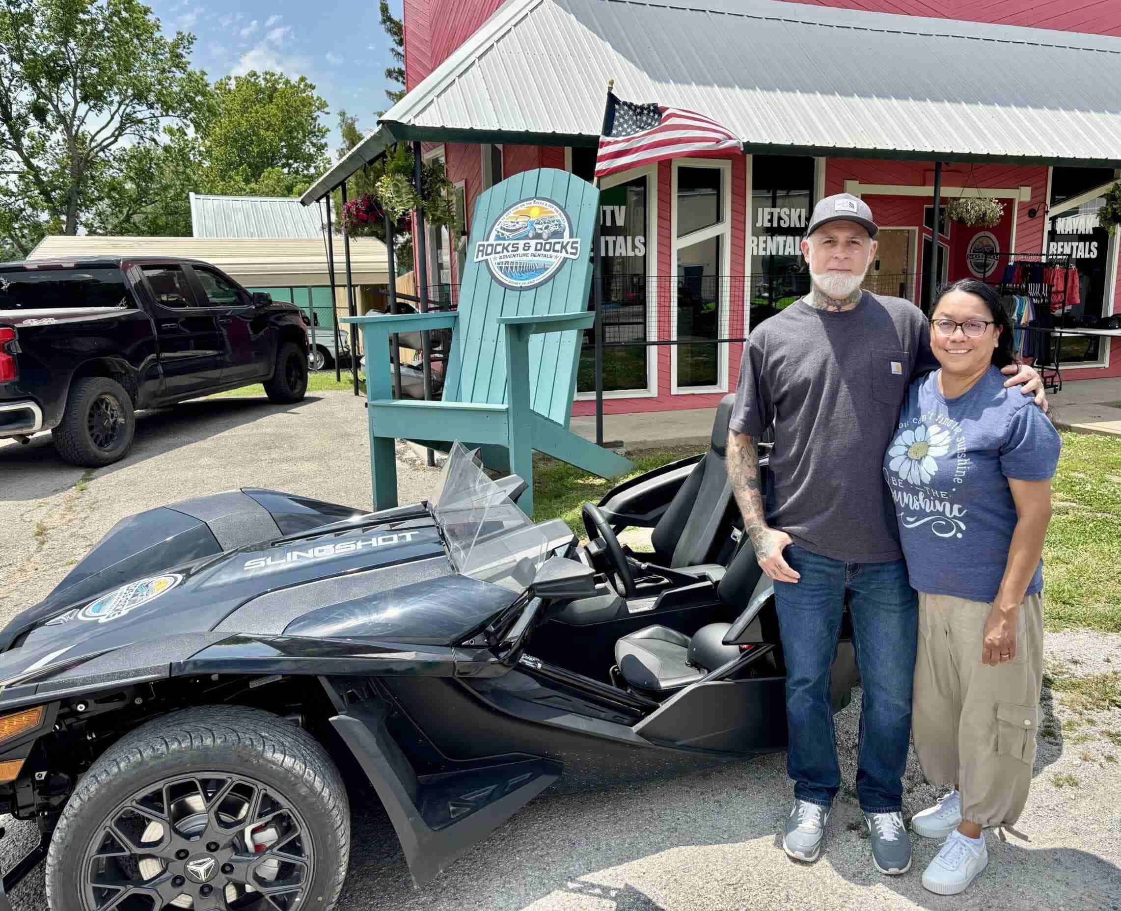 Guests with their Polaris Slingshot rental
