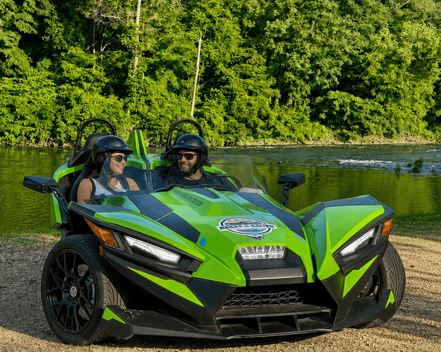 Green Polaris Slingshot during a Grand Lake road trip